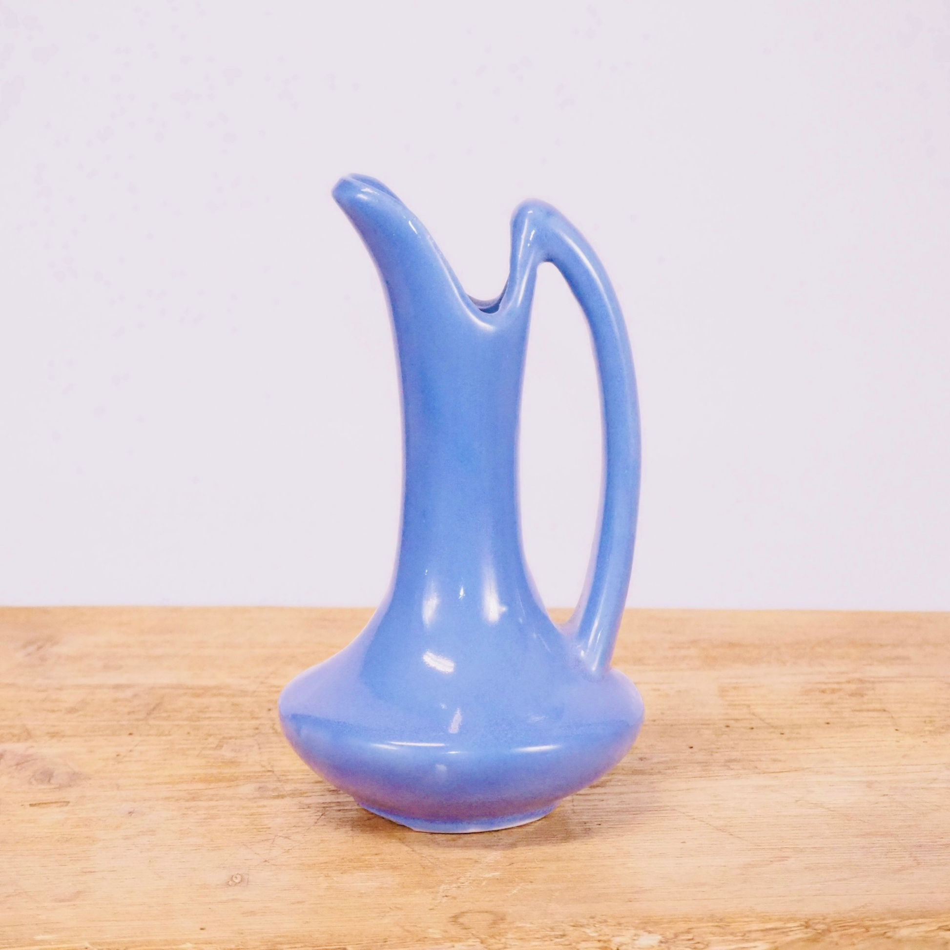 Periwinkle purple ceramic small flower bud vase pitcher.