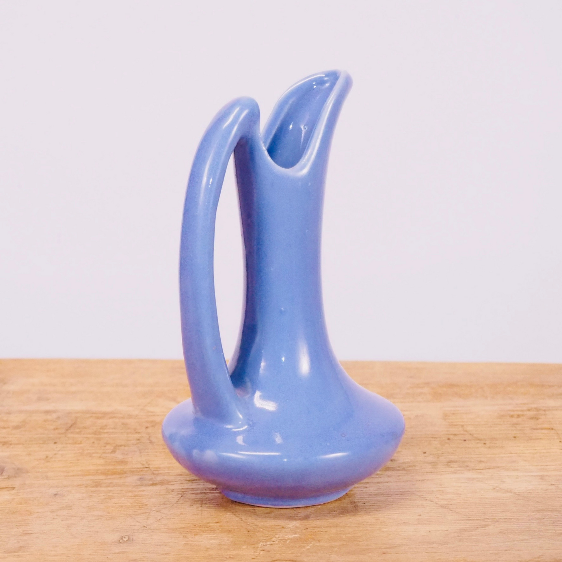 Periwinkle purple ceramic small flower bud vase pitcher.