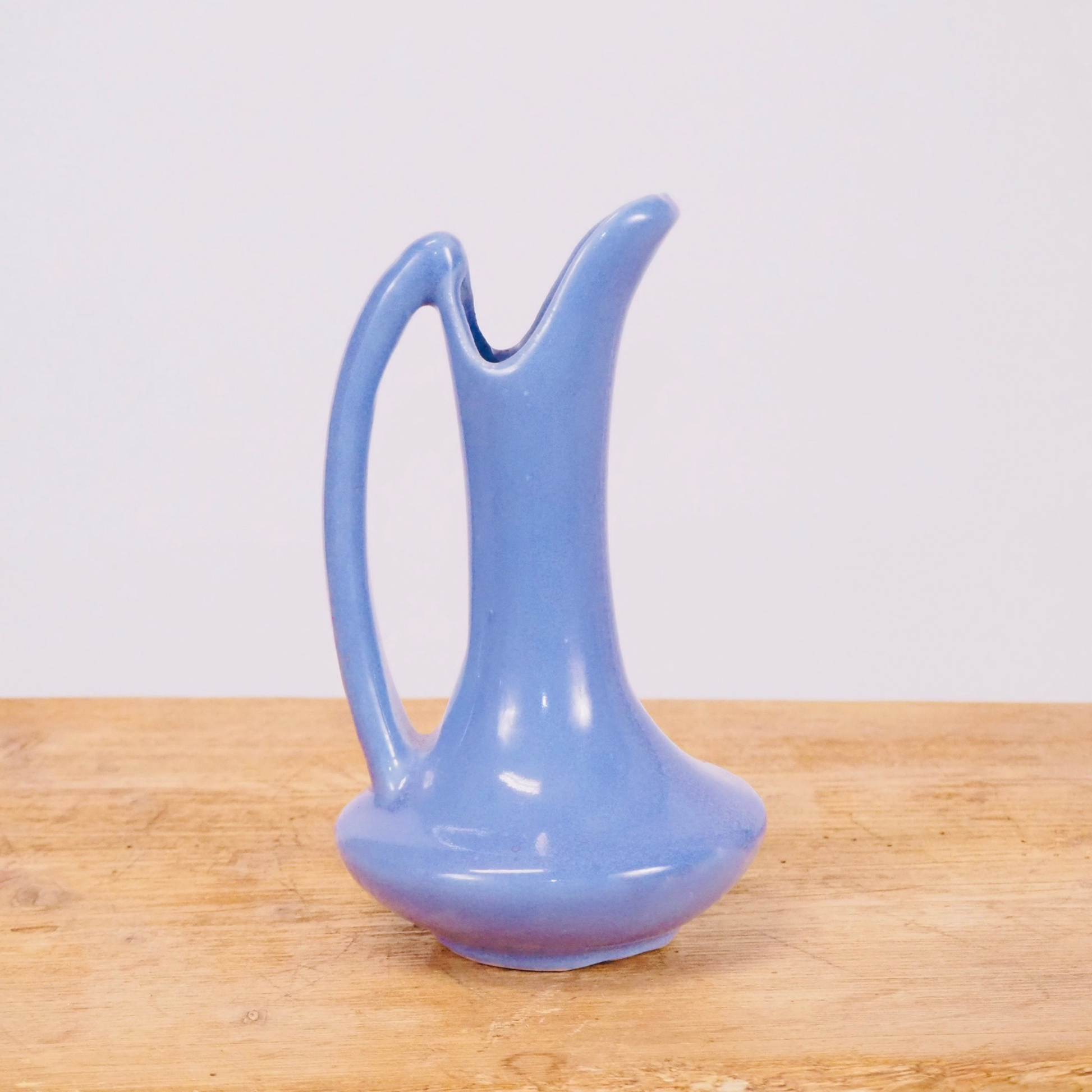 Periwinkle purple ceramic small flower bud vase pitcher.