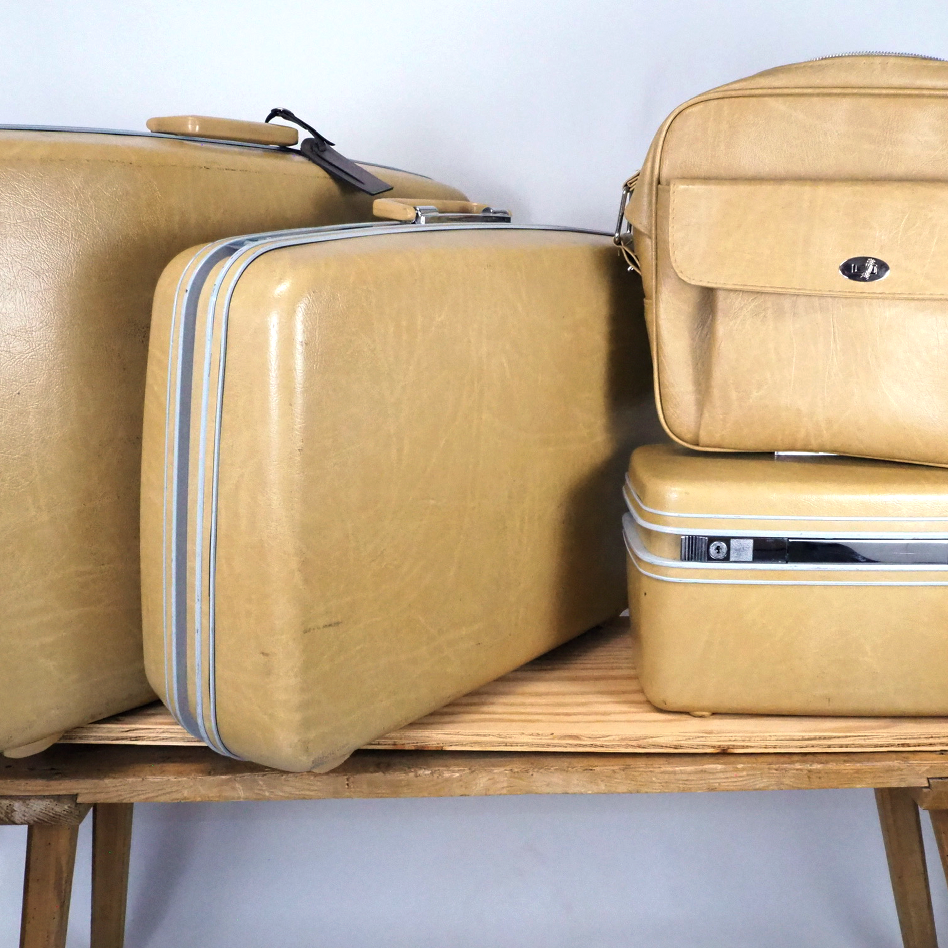 Stacked golden yellow Samsonite Contour Hardshell Luggage Set