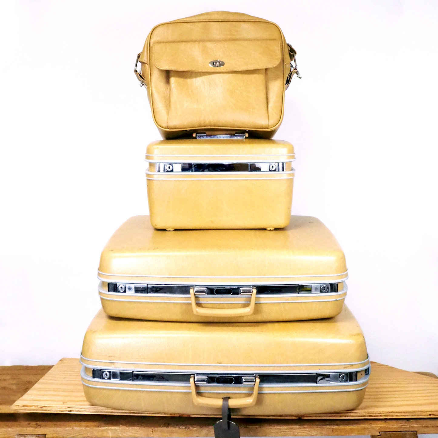 Stacked golden yellow Samsonite Contour Hardshell Luggage Set