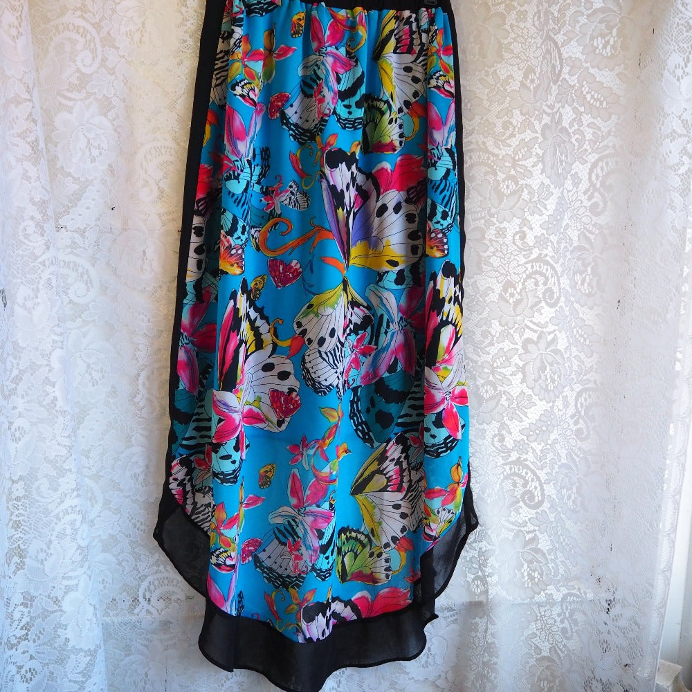 Abstract butterfly print, mermaid cut skirt by Nicole Miller. Back on hanger.